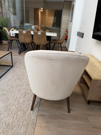 Sillón beige tipo concha