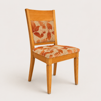 Silla de comedor tapizada con motivo de hojas